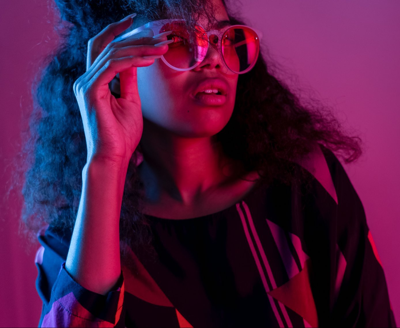 Fashion young african girl black woman wear stylish pink sunglasses glasses looking at camera isolated on party purple studio background horizontal banner for website design portrait copy space